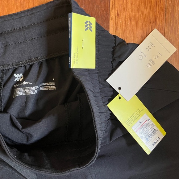 Target All In Motion 4" Woven Mid-Rise Shorts Active - Picture 3 of 3